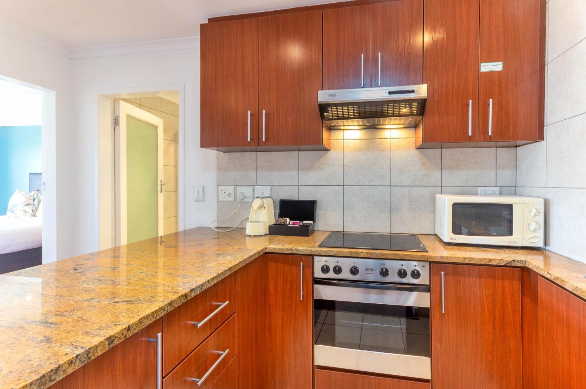 Mouille Point Apartments Кейптаун Номер фото