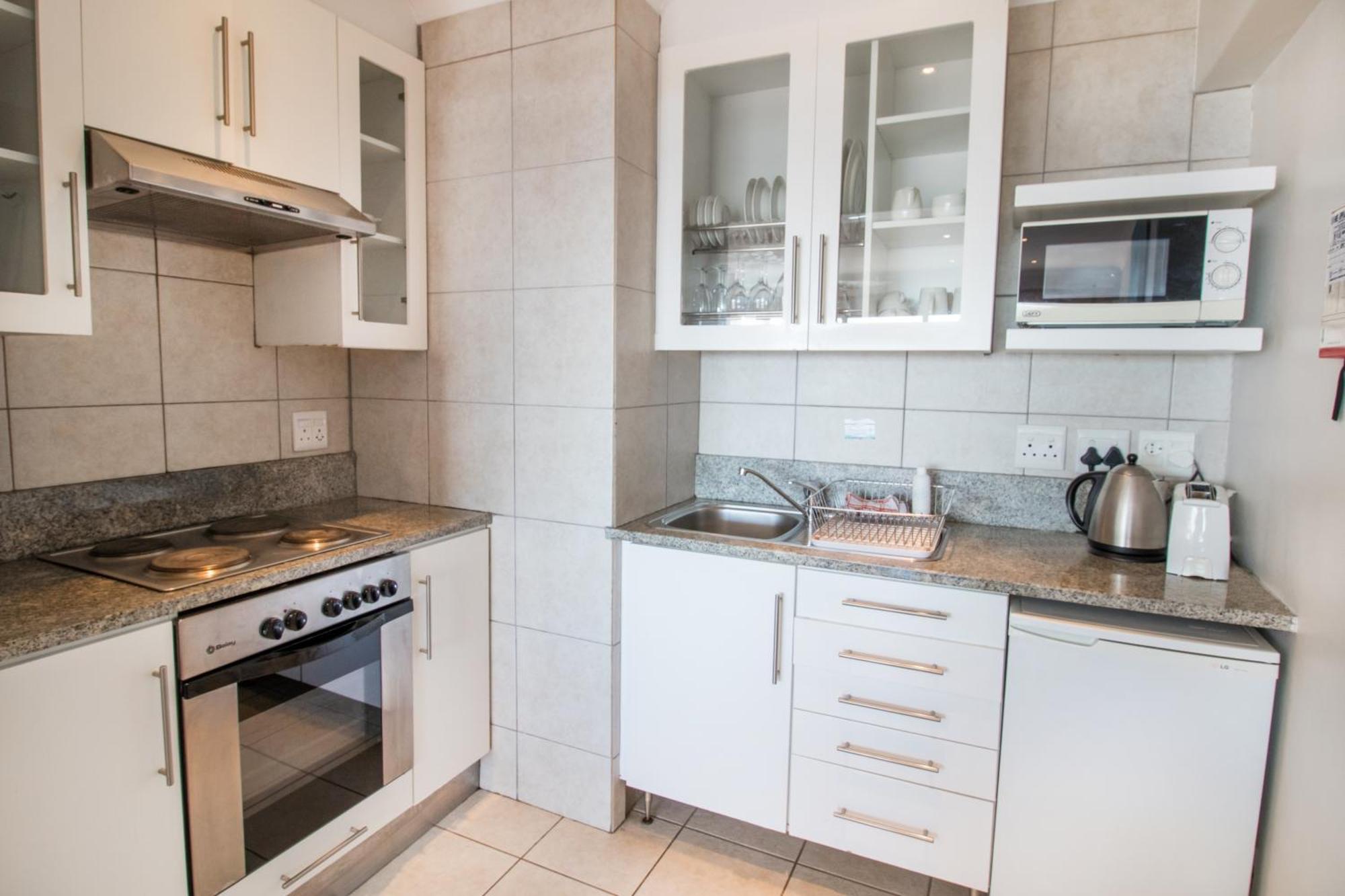 Mouille Point Apartments Кейптаун Номер фото